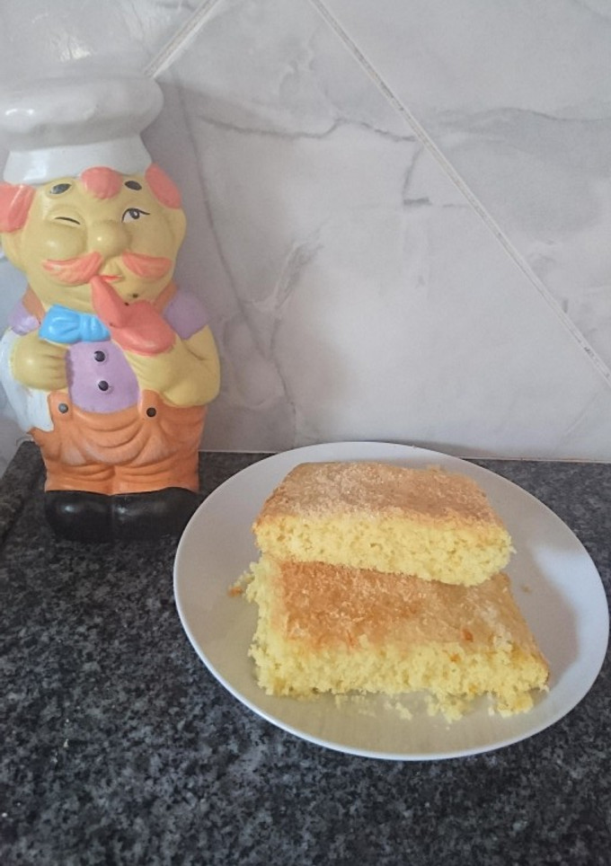 Una foto de Torta de naranja y coco 🍊🥥