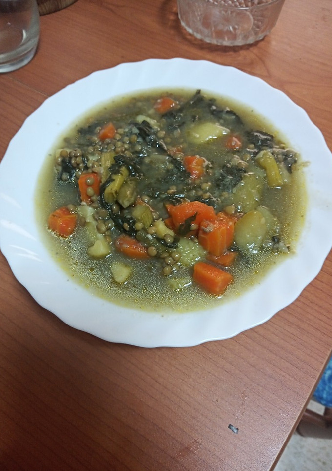 Una foto de Potaje de lentejas con espinacas