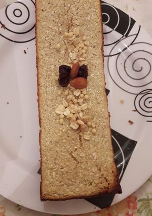 Una foto de Budín de avena y coco con granola y almendras