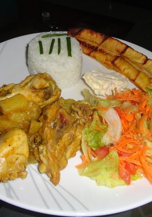 Una foto de Pollo en coco