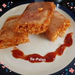 A picture of Schezwan Cheesy Carrot Stuffed Dosa.