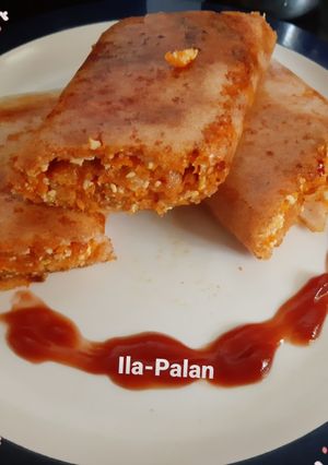 A picture of Schezwan Cheesy Carrot Stuffed Dosa.