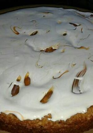 Una foto de Torta de avena, coco y dulce de leche