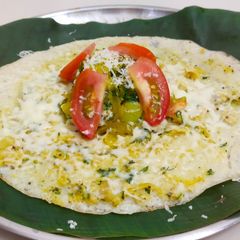A picture of Masala Cheese Open Dosa.