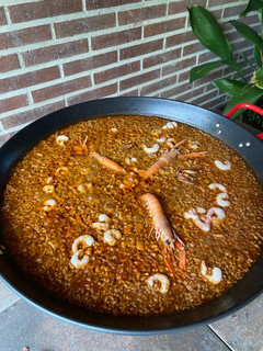 Una foto de Arroz a banda