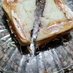 A picture of Bread with lots of veg.