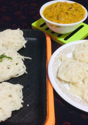 A picture of Idiyappam With Tomato kurma.