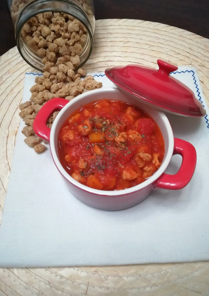 Una foto de Soja texturizada con salsa de tomate