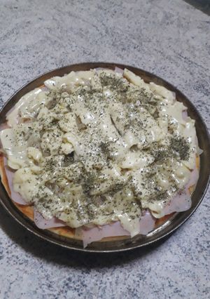 Una foto de Pizza con cebolla o fugazzeta!!!😘