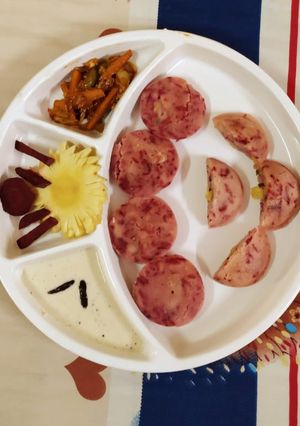A picture of Beetroot fruity idli.