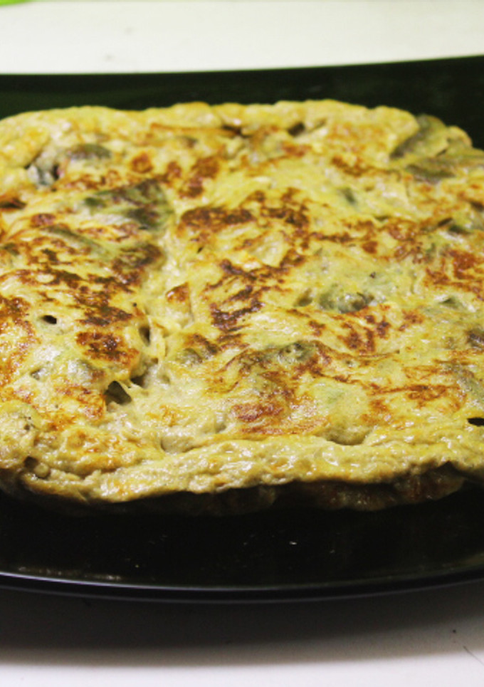 Una foto de Tortilla cuadrada de alcachofas con leche