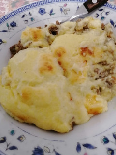 Una foto de Pastel de carne con polenta
