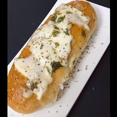 GARLIC, HERB AND CHEESE BUN A picture of GARLIC, HERB AND CHEESE BUN.