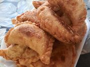 Una foto de empanada de carne freir
