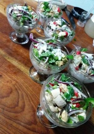 Una foto de Ceviche cocido de mariscos y jibia