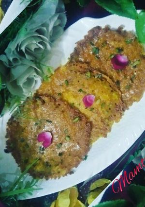 A picture of Paneer Maalpua.
