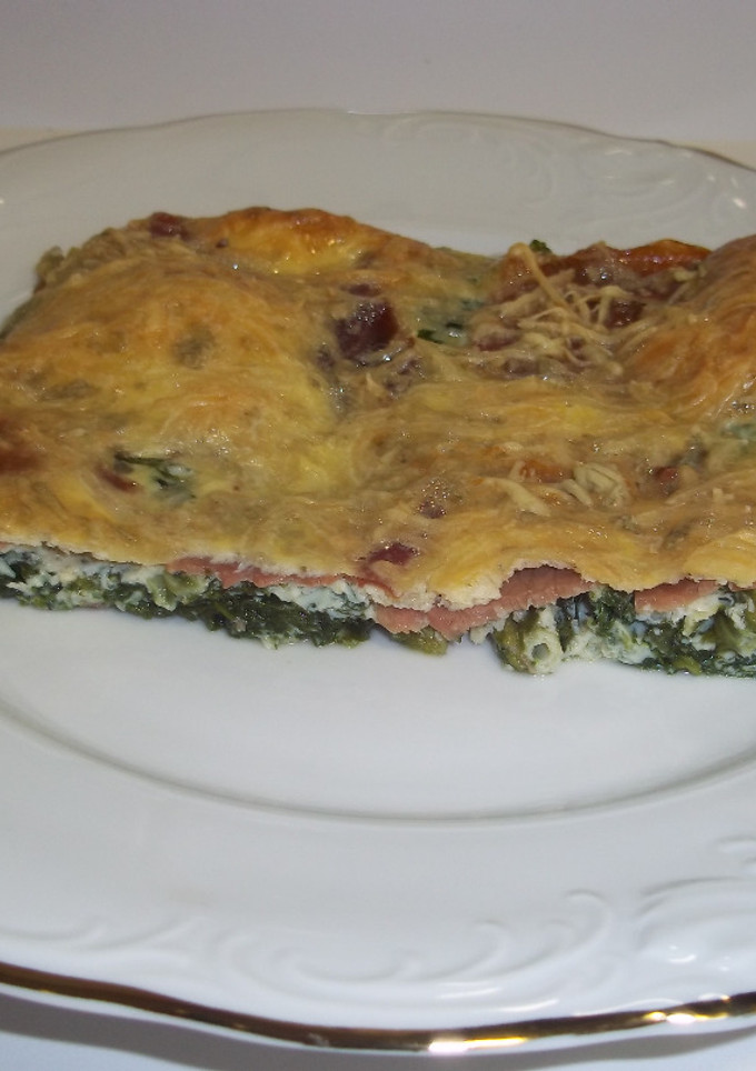 Una foto de Pastel de espinacas y jamón serrano