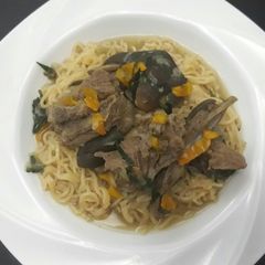 Goat meat peppersoup noddles A picture of Goat meat peppersoup noddles.