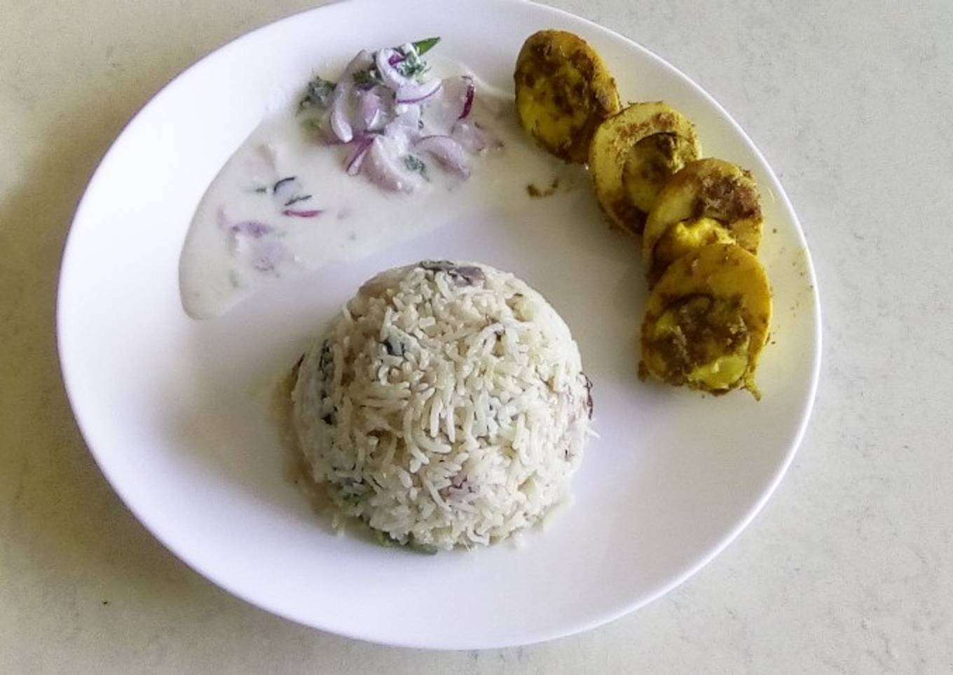 Coconut milk rice with egg fry and curd bachadi