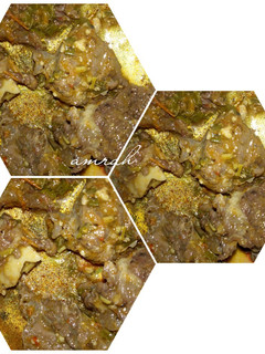 A picture of Ram meat pepper soup with ugwu and spinach.