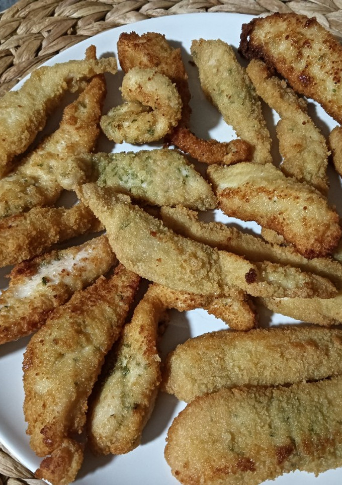 Una foto de Fingers de pollo