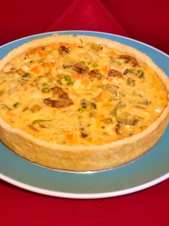 Una foto de Kuchen de pollo y verduras