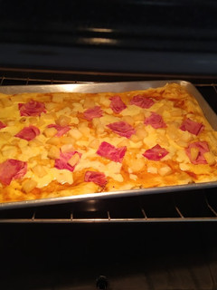 Una foto de Pizza hawaiana