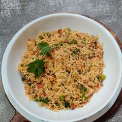 A picture of Vegetable FRIED RICE with WHITE BUTTER.