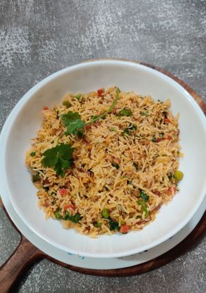 A picture of Vegetable FRIED RICE with WHITE BUTTER.