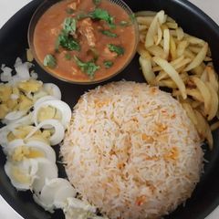 Shajahani chicken with zafrani rice A picture of Shajahani chicken with zafrani rice.