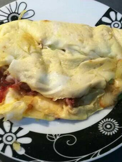 Una foto de 660. Tortilla de jamón y aguacate
