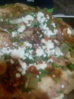 Una foto de Tlayuda de cecina