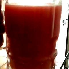 A picture of Pomegranate and orange juice.