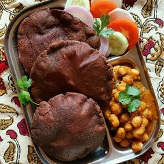 A picture of Ragi Bhatura with Chole.
