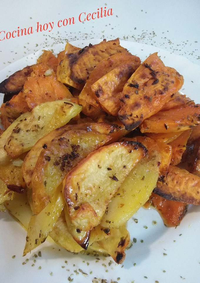 Una foto de Boniatos y patatas adobados, asados al horno
