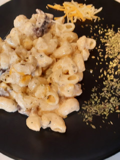 Una foto de Pasta en salsa de queso con setas shiitake