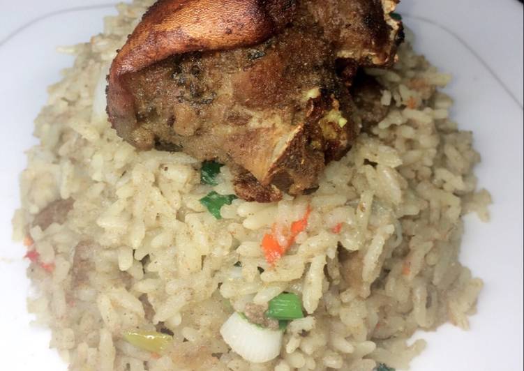 Coconut rice with fried goat meat