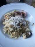 Risotto con canestrei erbe aromatiche e ricotta salata