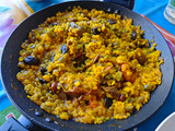 Arroz a la cazuela con gambones y setas