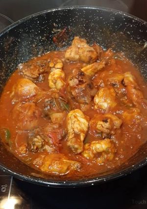Una foto de Pollo con tomate