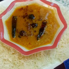 A picture of Daal with zeera rice.