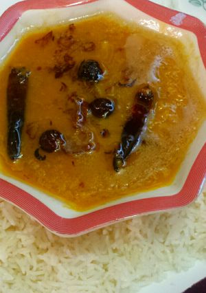 A picture of Daal with zeera rice.
