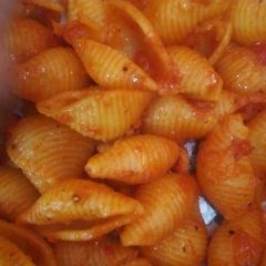 A picture of Pasta in red sauce.