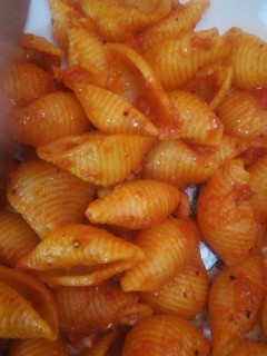 A picture of Pasta in red sauce.