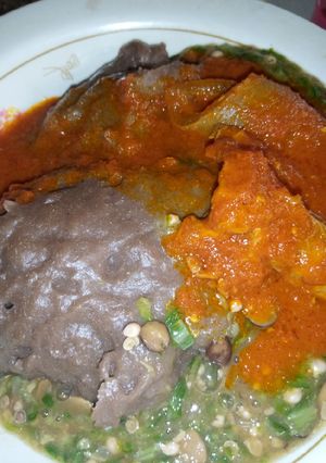 A picture of Amala and okro soup.