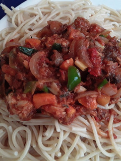 A picture of Liver sauce pair with spaghetti.