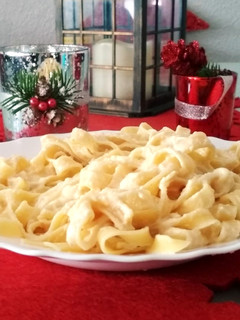 Una foto de Tallarines con salsa Alfredo
