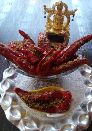 A picture of Stuffed red chilli pickle.