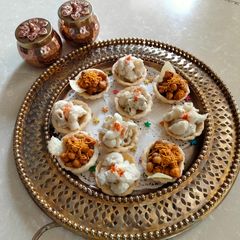 A picture of Mini tart shells filled with pasta and chana aloo chaat.