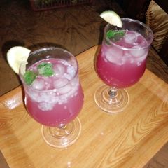 A picture of Pomegranate and sweet basil seeds drink.